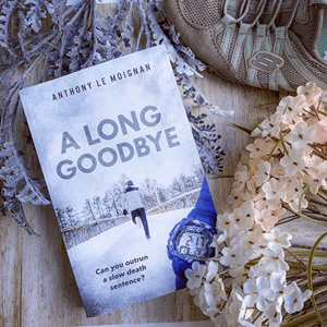 Novel About Alzheimer’s disease A Long Goodbye Anthony Le Moignan bookstagram with blue running shoes and pink and white flowers