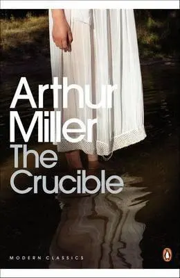 The Crucible by Arthur Miller book cover with bottom half of a young girl in a white gown