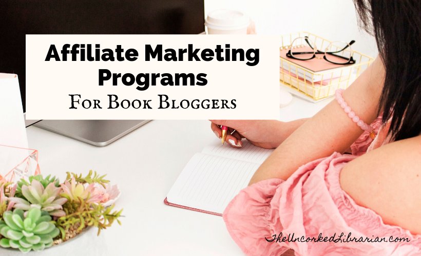 Book Affiliate Programs For Book Bloggers Blog Post Cover with woman in pink shirt sitting at a computer with a stack of pink books and pen and notebook open