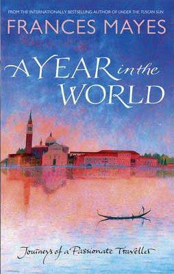 A Year In The World by Frances Mayes book cover with pastel lake and old city in the background