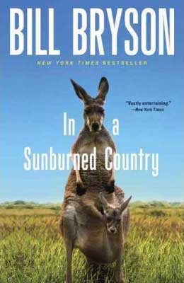 In A Sunburned County by Bill Bryson book cover with kangaroos and blue sky with green grass