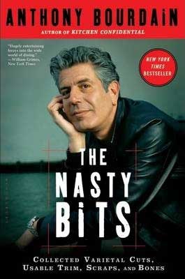 The Nasty Bits by Anthony Bourdain book cover with Anthony Bourdain leaning on his knees