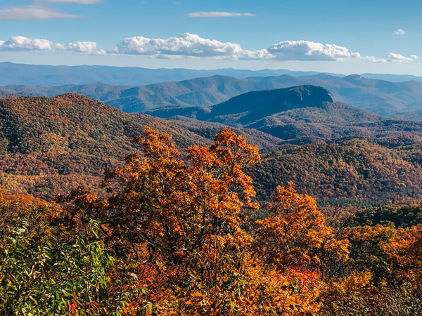 Blue Ridge Parkway Asheville NC during the fall with mountains and colorful trees