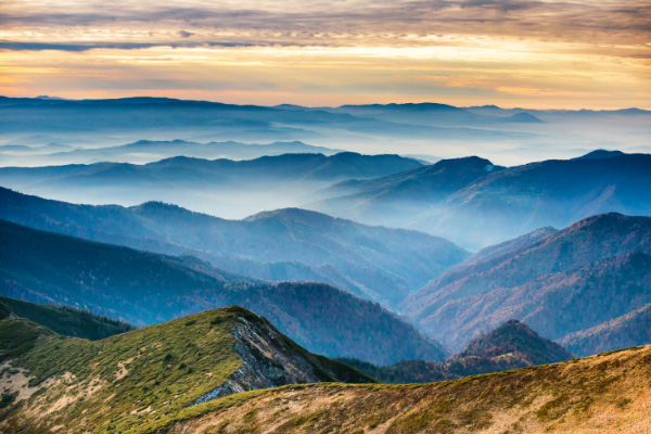 Reasons To Move to Asheville Blue Ridge Mountains with fog and mist