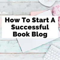 Book Blogging and Blogging About Books Guide with pink flowers, blank paper, pink book, and tea