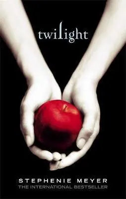 Fantasy Vampire Books For Teens Twilight by Stephanie Meyer book cover with pale white hands holding a red apple