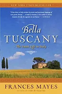Bella Tuscany: The Sweet Life In Italy by Frances Mayes book cover with blue sky with green grass and Tuscan home in background