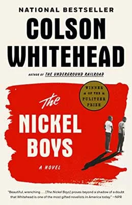 The Nickel Boys by Colson Whitehead red and white book cover with two Black teenagers walking and talking