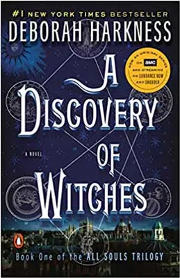 A Discovery Of Witches by Deborah Harkness book cover with city scape and wicca symbols
