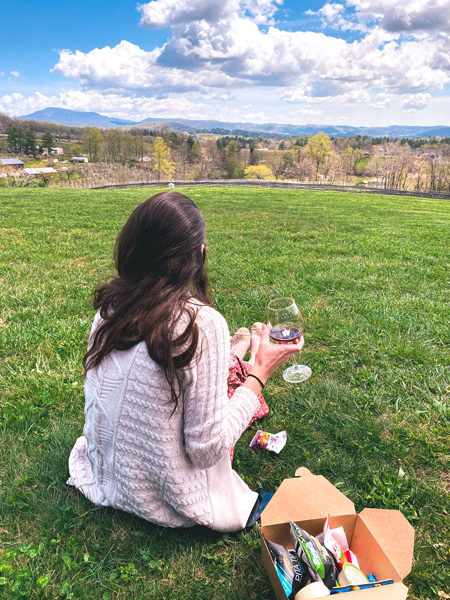 Christine with wine at Stone Ashe Vineyards