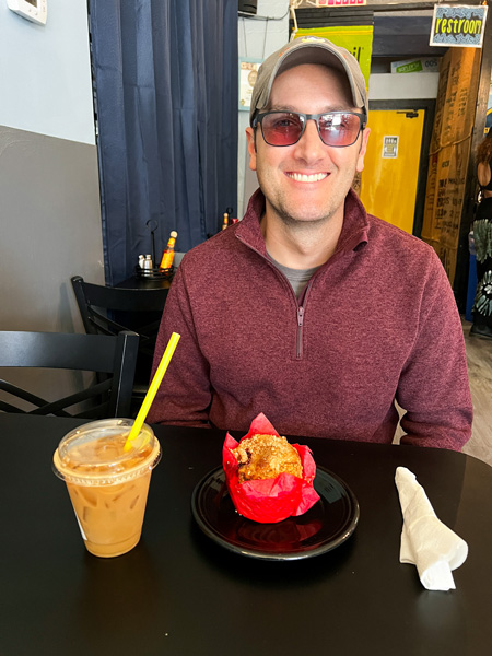 Tom with Yellow Mug muffin and coffee