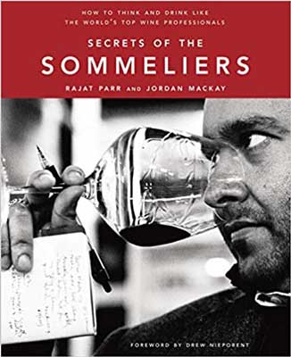 Secrets of the Sommeliers by Rajat Parr and Jordan Mackay book cover with black and white photo of man sniffing tasting of wine in a wine glass