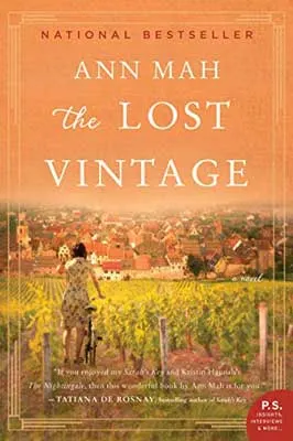 The Lost Vintage by Ann Mah book cover with woman in wine vineyards with orange sky looking out over a city