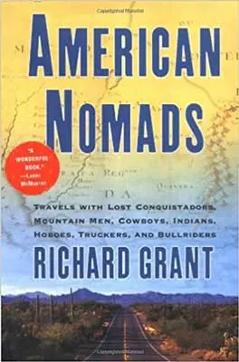 American Nomads by Richard Grant book cover with map of world hidden in sky and railroad tracks 
