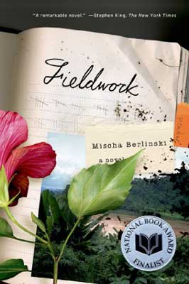 Fieldwork by Mischa Berlinski book cover with page and dark pink flower with green leaf