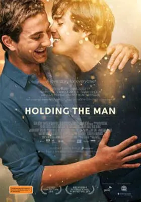 Holding The Man Movie Poster with two people in blue shirts embracing