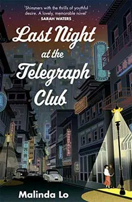 Last Night at the Telegraph Club by Malinda Lo book cover with San Francisco street at night with buildings and street lamp