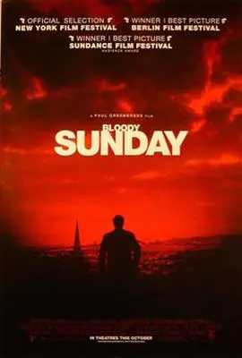 Bloody Sunday Film Poster with shadowed person with city in background and red sky