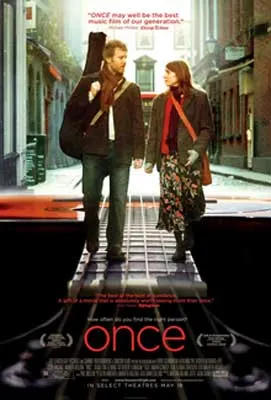 Once Irish Film Poster with man and woman looking at each other and walking with with coats on