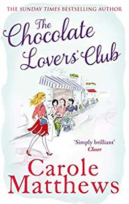 The Chocolate Lovers’ Club by Carole Matthews book cover with blonde person in red skirt and pink top walking toward a shop with purple striped awning