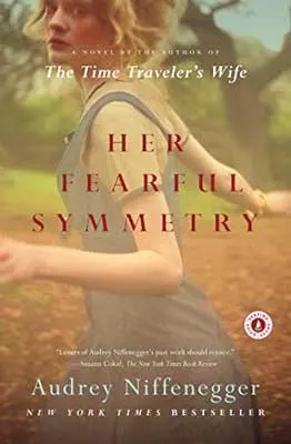 Her Fearful Symmetry by Audrey Niffenegger book cover with person in dress moving on brown and green landscape