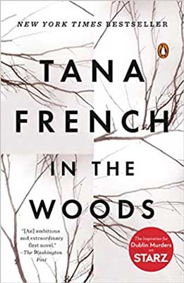 In The Woods by Tana French book cover with scattered images of tree branches