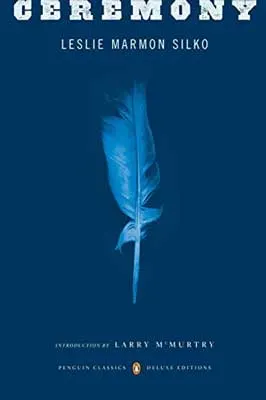Ceremony by Leslie Marmon Silko book cover with single blue-white feather