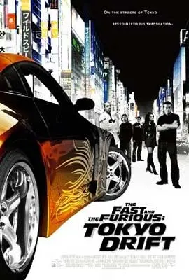 Fast & Furious Tokyo Drift Movie Poster with orange and black shinny car and four people in black standing to the side front of it in city