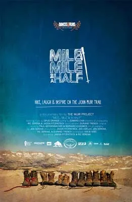 Mile Mile and a Half Documentary Poster with landscape with ground, mountains, blue sky, and lined up hiking shoes