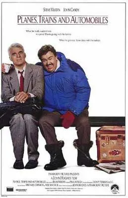 Planes trains and automobiles movie poster with two older men sitting on a bench one in blue winter jacket and the other in suit and red tie