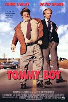 Tommy Boy Movie Poster with two white men in jackets and ties standing in middle of the road