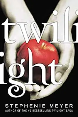 Twilight series by Stephenie Meyer book cover with white hands holding a red apple