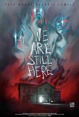 We Are Still Here Movie Poster with three ghosts coming out of top of haunted house surrounded in red and blue fog and lights
