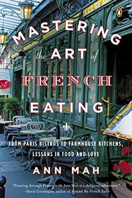 Mastering the Art of French Eating by Ann Mah book cover with image of restaurant with outdoor tables and chairs