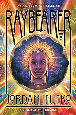Raybearer by Jordan Ifueko book cover with person's face at center with golden glowing like crown