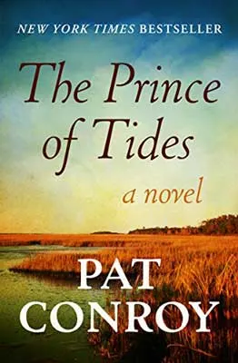 The Prince of Tides by Pat Conroy book cover with water and brown hay-like grass or marshy area with blue yellow sky