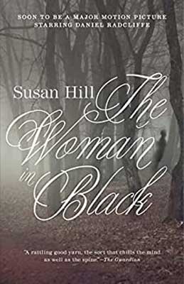The Woman In Black by Susan Hill book cover with foggy and dark forest