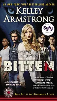 Bitten by Kelley Armstrong book cover with tv tie in with five people standing in a V formation with blonde woman up front and a series of men behind her