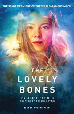 The Lovely Bones by Alice Sebold book cover with white blonde woman's face in glowing blue and yellow clouds
