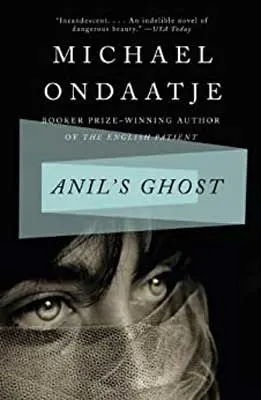 Anil’s Ghost by Michael Ondaatje book cover with black and white image of person's face with hair in eyes