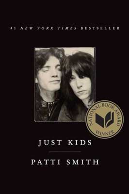 Just Kids by Patti Smith book cover with black and white photograph of man and woman with heads bumped together