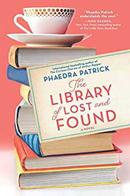 The Library of Lost and Found by Phaedra Patrick book cover with stacked up books and teacup on top