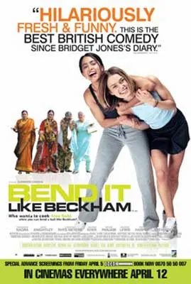 Bend It Like Beckham Movie Poster with two people holding each other and laughing with South Asian family behind them
