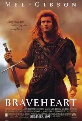 Braveheart Movie Poster with image of man with long redish orange hair holding a sword with fire behind him