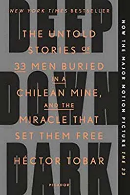 Deep Down Dark: The Untold Stories of 33 Men Buried in a Chilean Mine, and the Miracle That Set Them Free by Hector Tobar book cover with black main title and orange subtitle on gray background