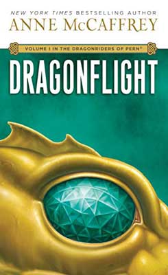 Dragonflight by Anne McCaffrey book cover with golden dragon with a green eye