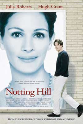 Notting Hill Movie Poster with black and white image of a woman as if a poster on a wall and man in black sweater and khakis standing near image