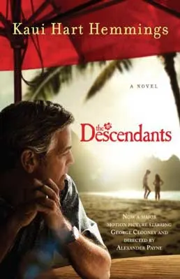 The Descendants by Kaui Hart Hemmings book cover with white man with gray hair looking pensively at two people along shore under red umbrella