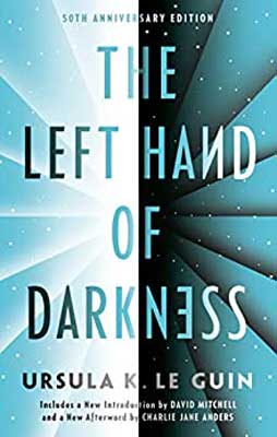 The Left Hand Of Darkness by Ursula K. Le Guin book cover with light blue and turquoise sides with stars and beams shooting out or in