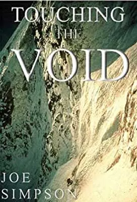 Touching the Void: The True Story of One Man’s Miraculous Survival by Joe Simpson book cover with snowy cliff facade